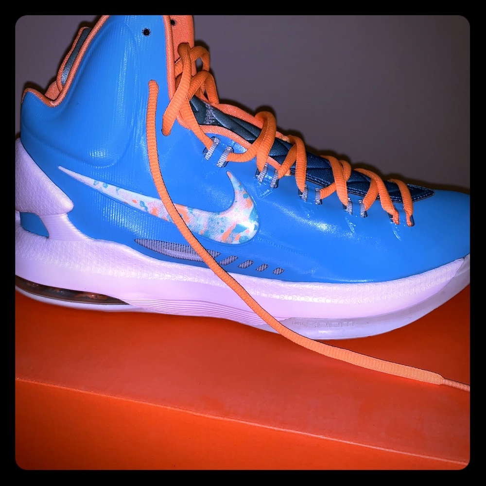 Nike Lebron James 10 turquoise and orange sneakers